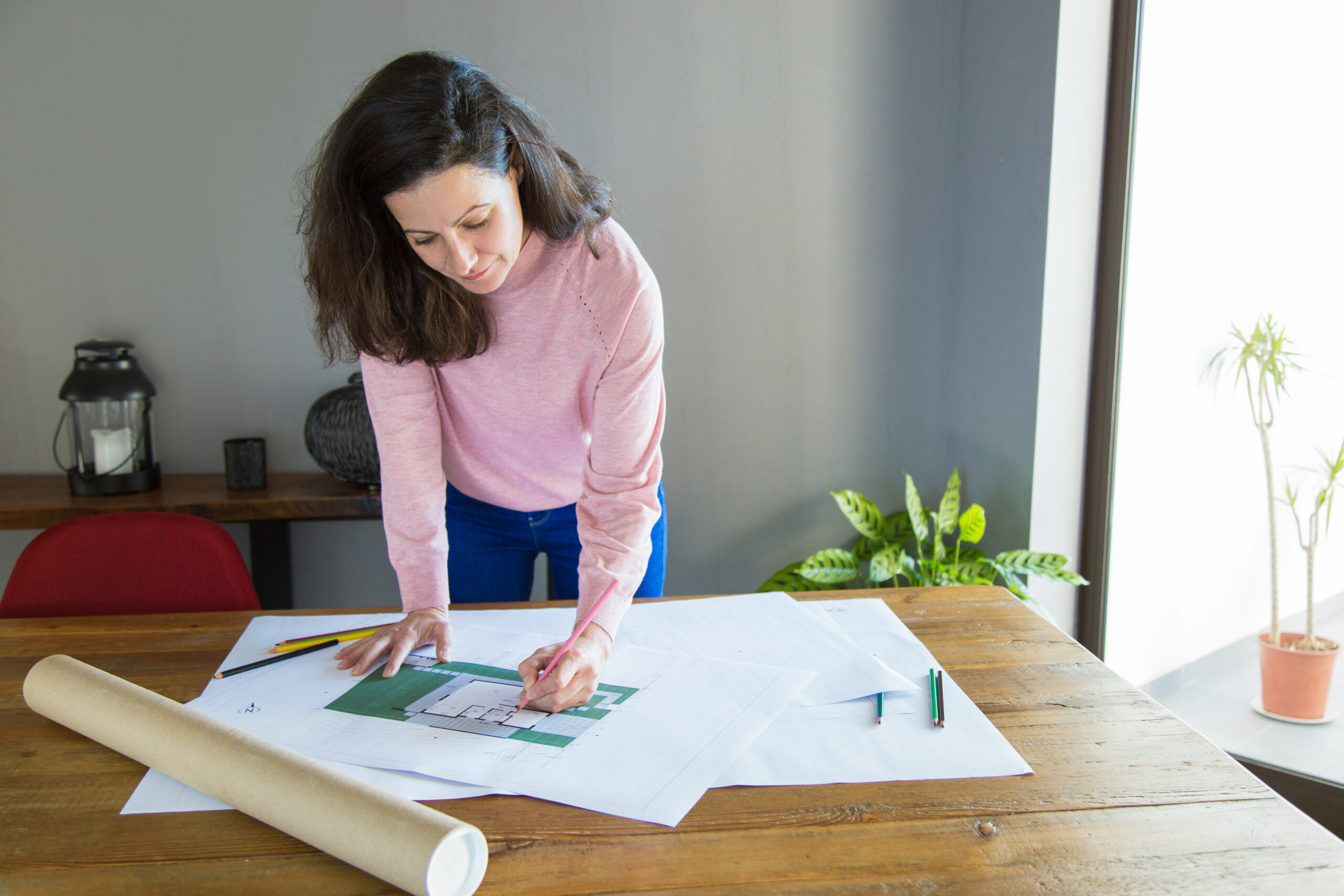 Focused professional working on apartment design project
